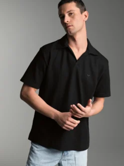 Oversized Poloshirt ohne Knopfleiste in Waffeloptik Schwarz